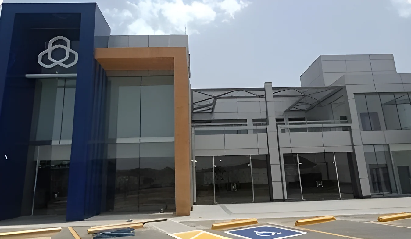 Bank Al Rajhi branch entrance with its blue clad portal